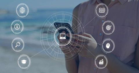 Woman holding smartphone using augmented reality interface on sunny beach for mobile tech