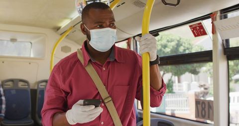 Man Wearing Mask on Bus Using Smartphone for Commuting - Download Free Stock Images Pikwizard.com