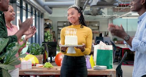 Team Celebrating Birthday in Modern Office Setting