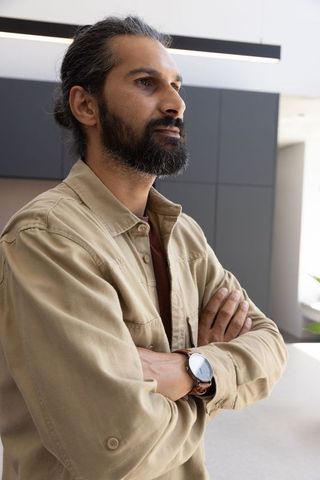 Confident man in modern kitchen with contemporary design