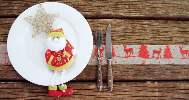 Festive Christmas Table Setting With Santa Decor and Rustic Elements - Download Free Stock Images Pikwizard.com