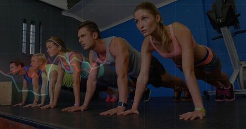 Diverse group engaging in push-up challenge with health graph overlay