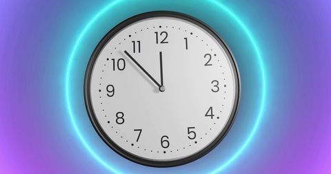 Modern Wall Clock with Vibrant Pink and Blue Neon Background