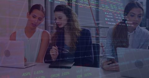 Diverse professionals analyzing data with advanced technology overlay