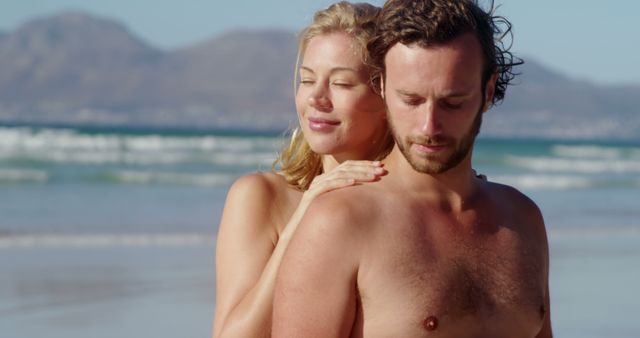 Romantic Couple Relaxing on Beach at Sunset - Download Free Stock Images Pikwizard.com