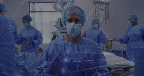 Surgeon Preparing for Operation in Sterile Hospital Room