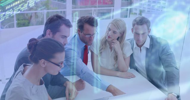 Image of interface with data processing over diverse businesspeople over a plan at office - Download Free Stock Photos Pikwizard.com