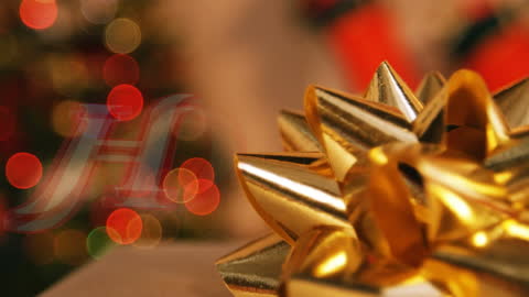 Festive Christmas Lights with Gold Gift Bow