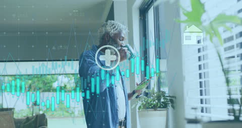 Senior Man Analyzing Data with Icons and Graphs Overlay