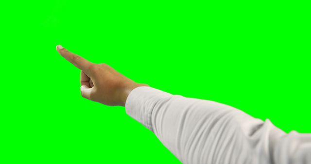 Close-Up Hand Pointing Forward with Green Background for Concept Presentation - Download Free Stock Images Pikwizard.com