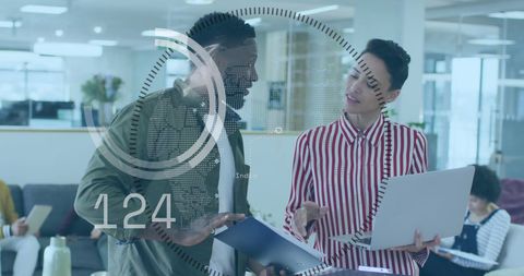 Diverse Professionals Discussing With Digital Interface Concept