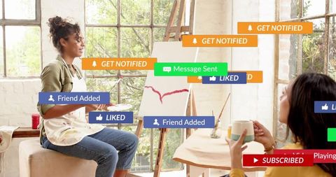 Sunlit Art Studio Collaboration with Painter at Easel and Social Media Notifications