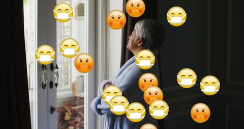 Worried senior woman during pandemic with mask emojis