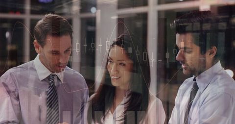 Diverse Colleagues Collaborating on Financial Data