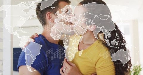 Couple Embracing with Engagement Overlay Symbolizing Global Love