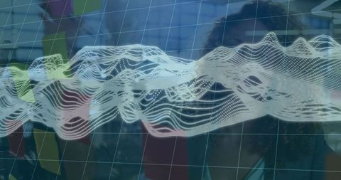 Professional Women Analyzing Data with Advanced Technology in Modern Office