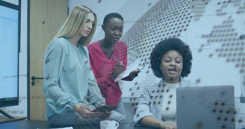 International team analyzing data with digital overlay