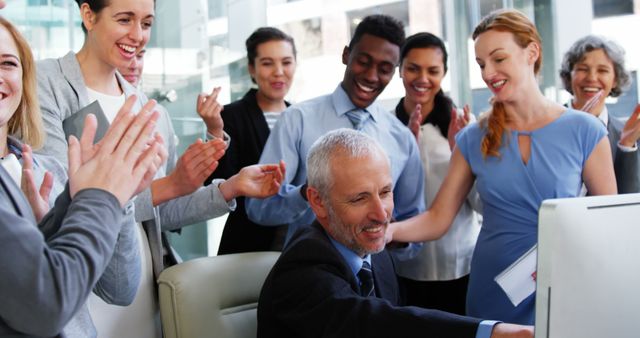 Diverse Team Celebrating Business Success in Office - Download Free Stock Images Pikwizard.com