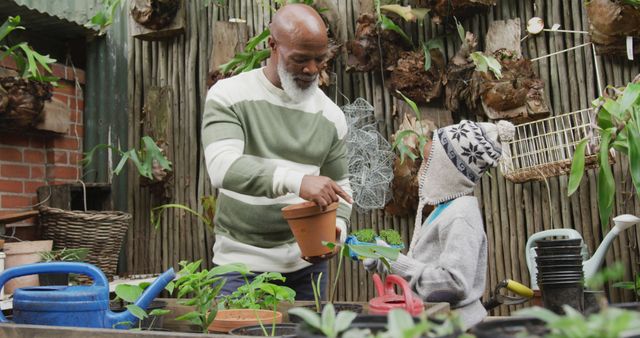 Father and Daughter Gardening Together in Greenhouse - Download Free Stock Images Pikwizard.com