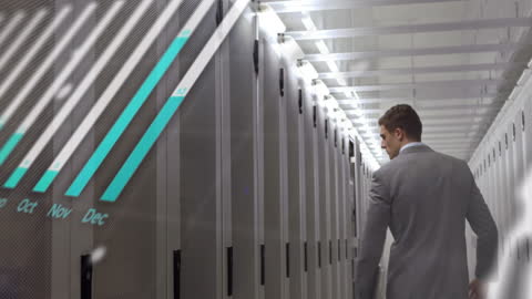 Businessman Overseeing Modern Data Center Operations
