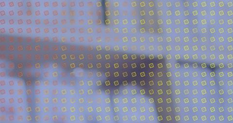 Colorful geometric grid on blurred background