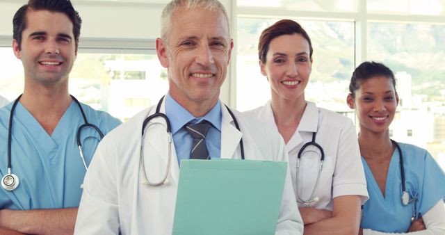 Healthcare Team of Doctors and Nurses Smiling at Camera in Hospital - Download Free Stock Images Pikwizard.com