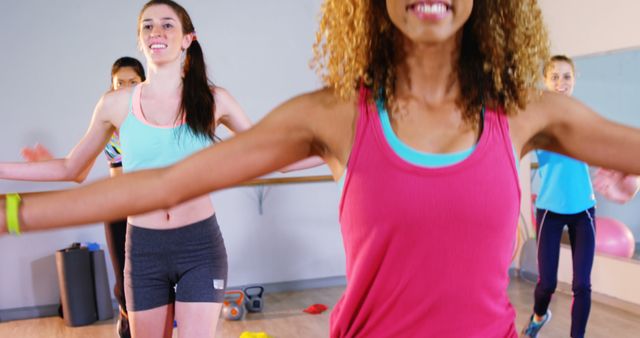 Group of Women Enjoying Energetic Fitness Class - Download Free Stock Images Pikwizard.com