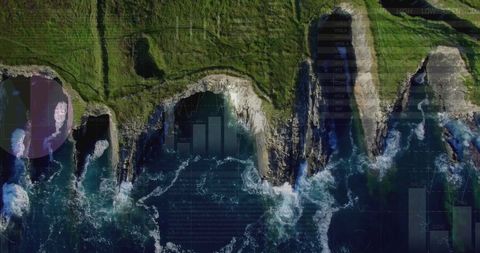 Aerial View of Coastal Cliffs with Overlaid Financial Graphs
