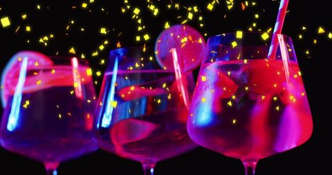 Colorful Cocktails and Falling Confetti in Party Atmosphere