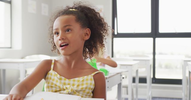 African-American Girl Participating In Classroom Activity - Download Free Stock Images Pikwizard.com