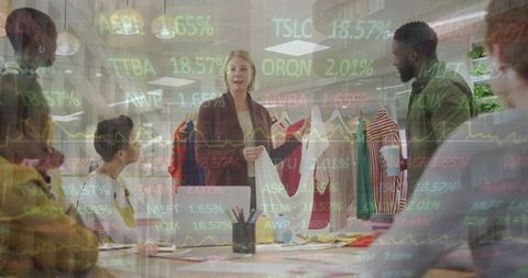 Multiracial team collaborates with financial data overlay