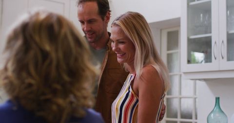 Family Connecting Over Coffee in Modern Kitchen