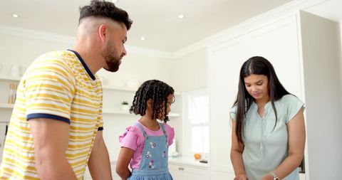 Family Bonding While Preparing Meal in Home Kitchen