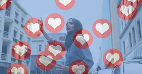 Woman in Hijab Hailing Taxi with Floating Love Icons in Urban Setting - Download Free Stock Images Pikwizard.com