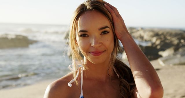 Smiling Young Woman Enjoying Beach, Portrait at Sunset - Download Free Stock Images Pikwizard.com