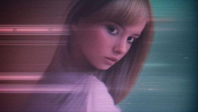 Futuristic Woman in Neon Light with Digital Glitch Effect