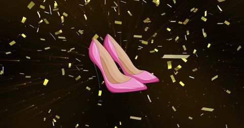 Pink high heels with confetti on black background