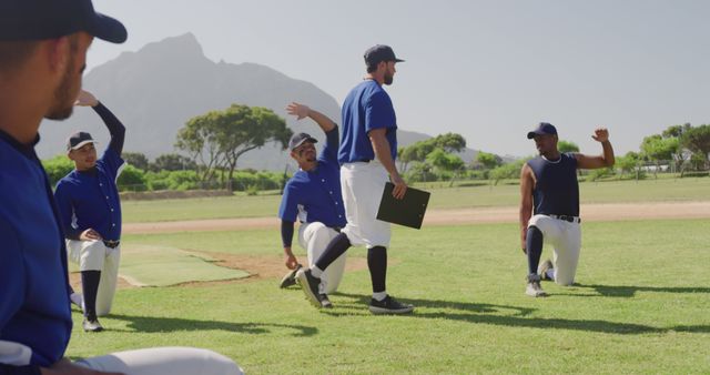 Young Baseball Team Practicing on Field with Coach - Download Free Stock Images Pikwizard.com