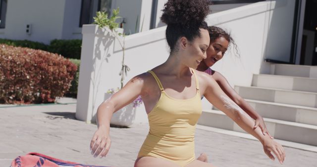 Mother Daughter Bonding Applying Sunscreen Outdoors - Download Free Stock Images Pikwizard.com