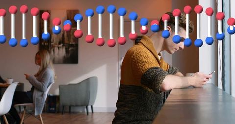Man in Café Using Smartphone with DNA Helix Graphic