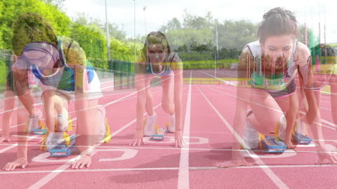 Dynamic Scene of Track Athletes at Starting Line