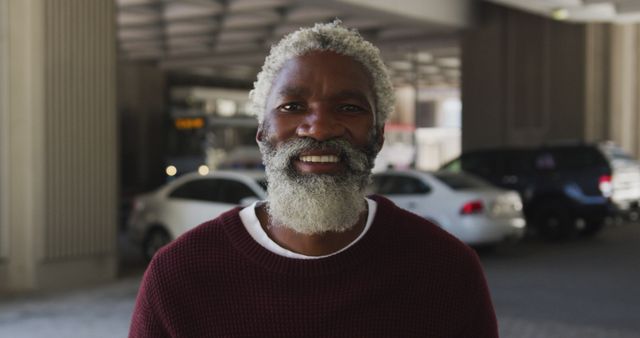 Smiling Elderly Man with Grey Beard Outdoor Underneath Urban Architecture - Download Free Stock Images Pikwizard.com