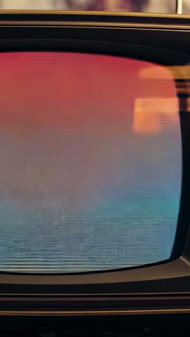 Vertical video playing retro CRT with pastel scanlines and shifting ambient light