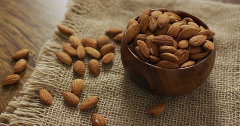 Almonds in Wooden Bowl on Burlap for Healthy Eating Concept - Download Free Stock Images Pikwizard.com