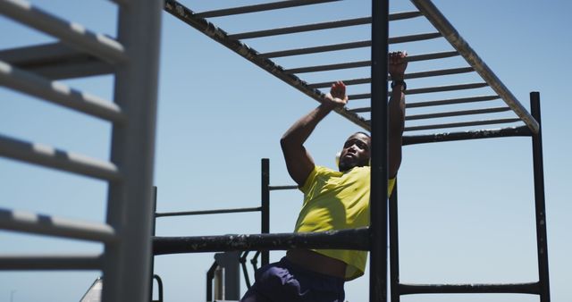 Athletic Man Exercising on Outdoor Monkey Bars - Download Free Stock Images Pikwizard.com