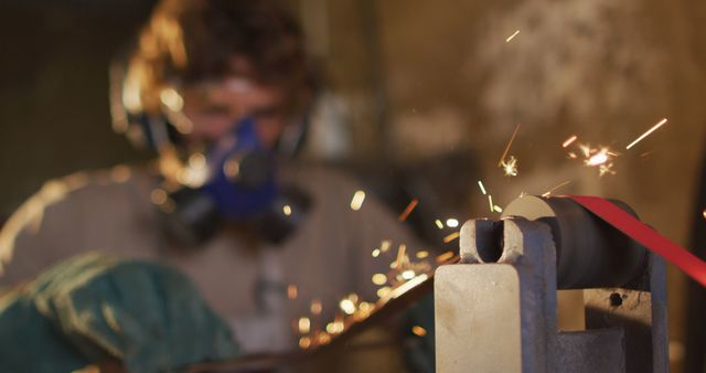 Industrial Worker Grinding Metal with Protective Gear - Download Free Stock Images Pikwizard.com