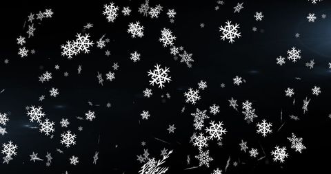Abstract Snowflakes Falling Against Dazzling Dark Background