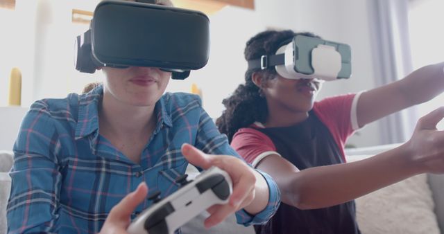 Diverse friends enjoying VR gaming at home - Download Free Stock Images Pikwizard.com