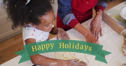Mother and Daughter Baking Christmas Cookies with Seasonal Joy