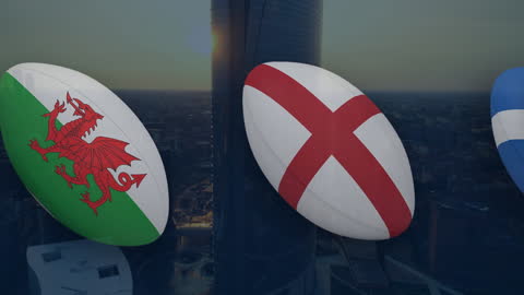 Rugby Balls with National Flags Floating Over Cityscape